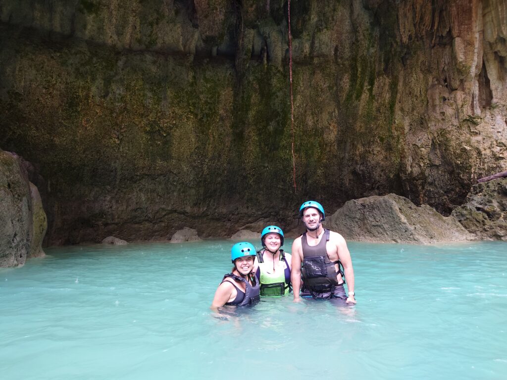 Rhys Sain, Lauren Higgins and Taylor Shepherd during their Kawasan Falls canyoneering adventure in the Philippines