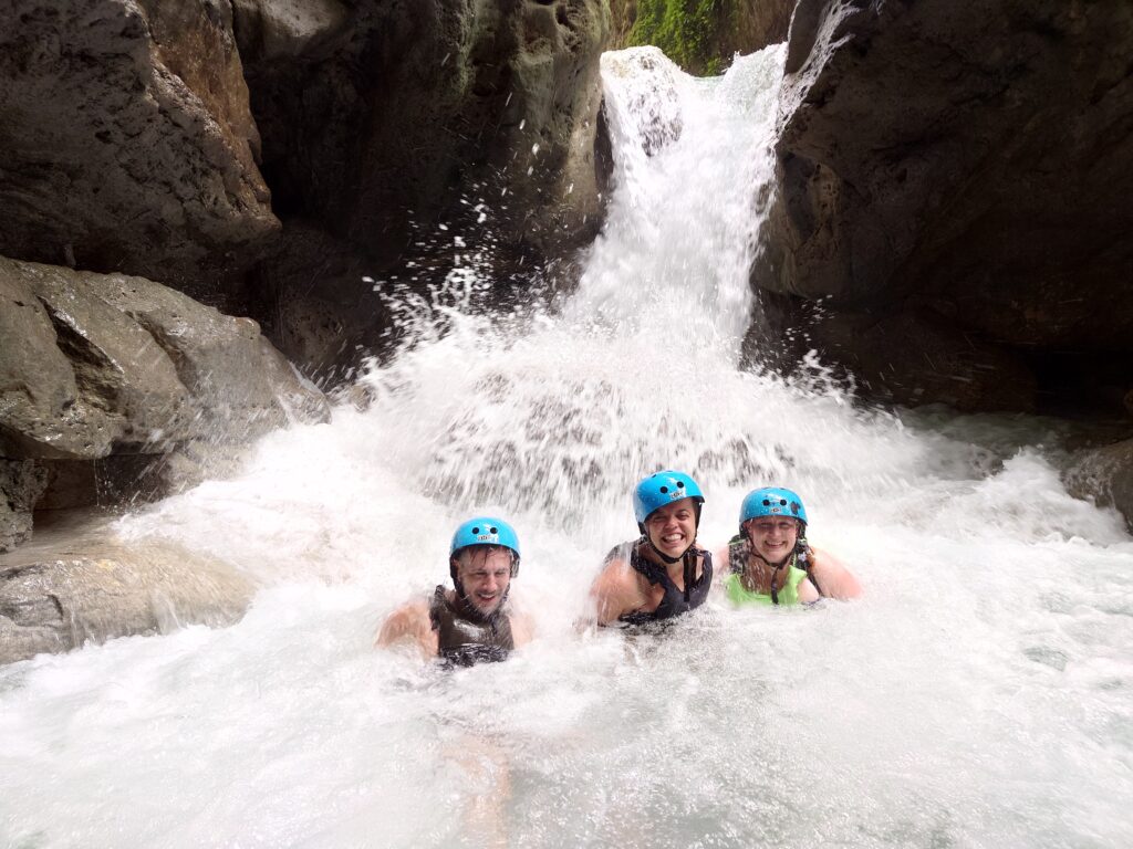 Rhys Sain, Lauren Higgins and Taylor Shepherd during their Kawasan Falls canyoneering adventure in the Philippines