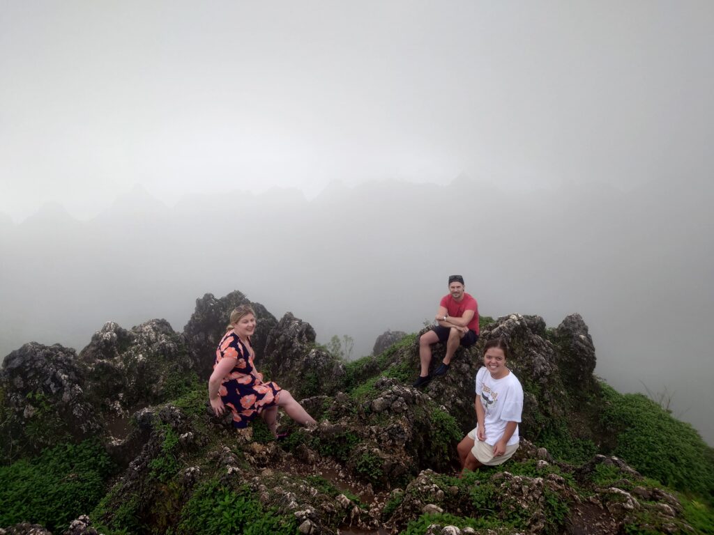 Lauren Higgins, Taylor Shepherd and Rhys sain on Rhys Sain on Osmeña Peak, Cebu, Philippines