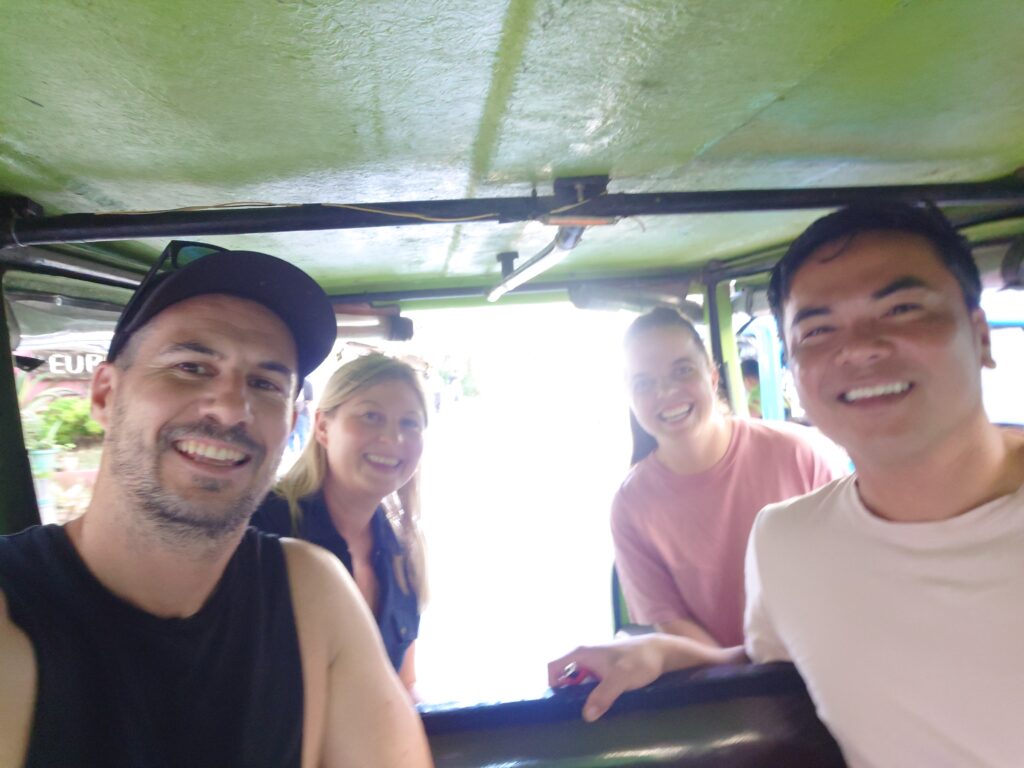 Rhys Sain, Jerico Reyes, Lauren Higgins and Taylor Shepherd in a Tuktuk on Borcay, in the Philippines