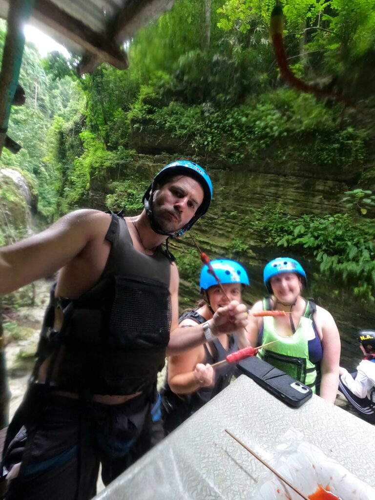Rhys Sain, Taylor Shepherd and Lauren Higgins stopping for lunch during our Kawasan Falls canyoneering adventure