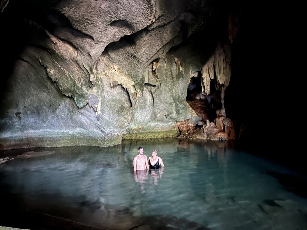Rhys Sain and Lauren Higgins in the cave on Black Island, Coron, Philippines