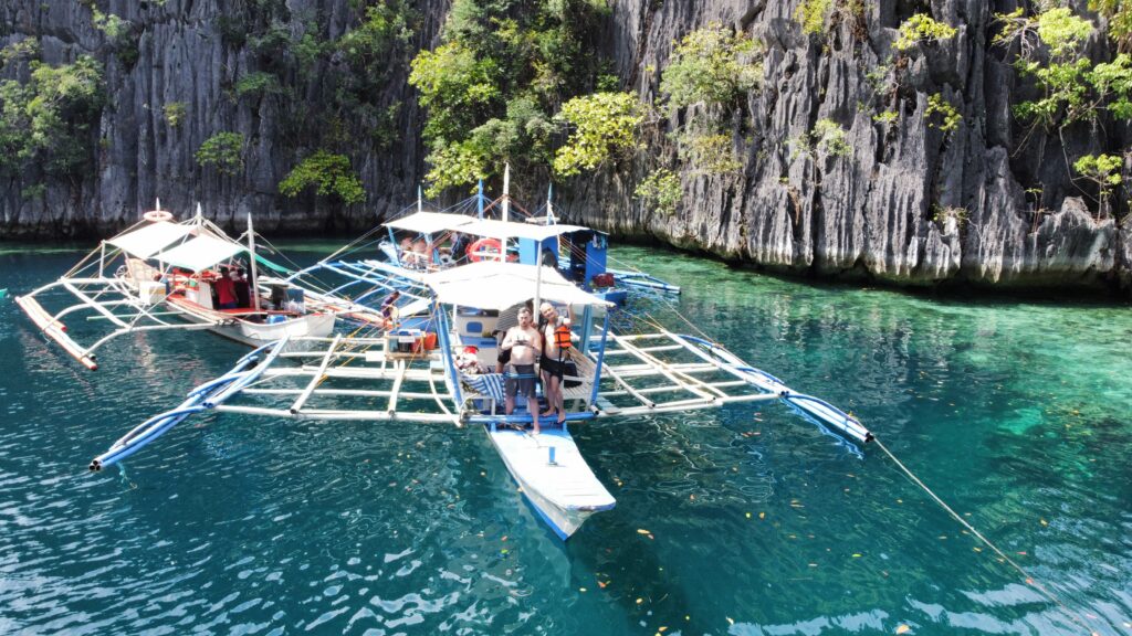 Rhys Sain and Wendell Clavin on our boat in the Twin Lagoons in Coron, Philippines