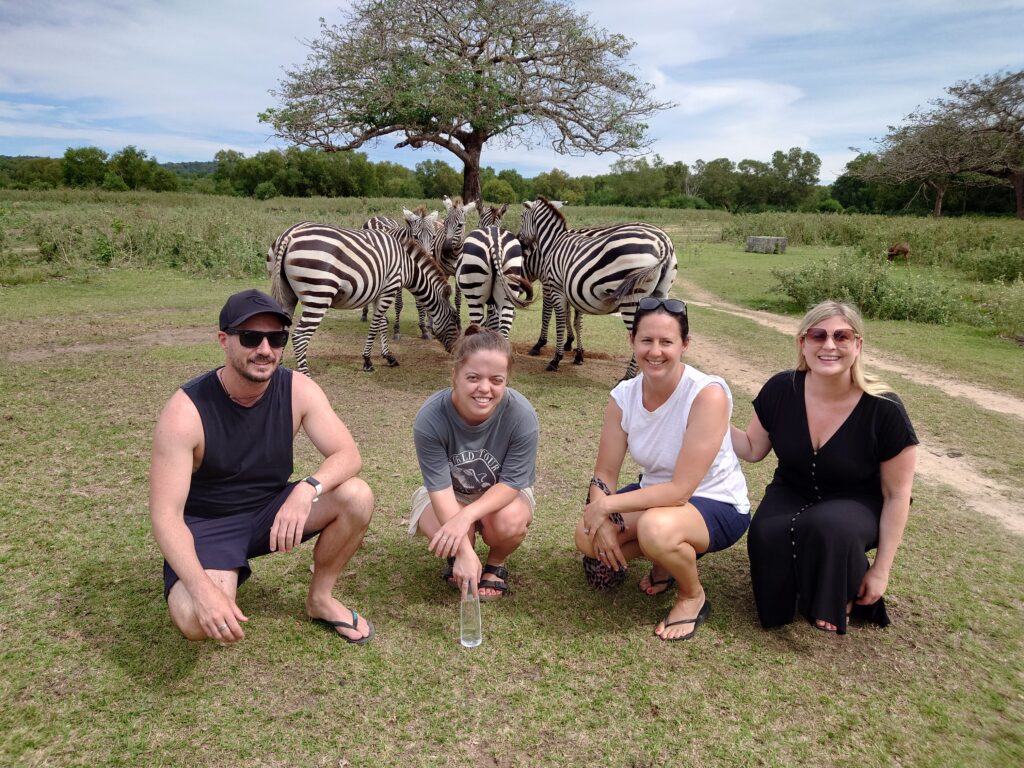 Lauren Higgins, Rhiana Ravindran, Rhys Sain and Taylor Shepherd with the Zebra at Calauit Safari Park, Coron